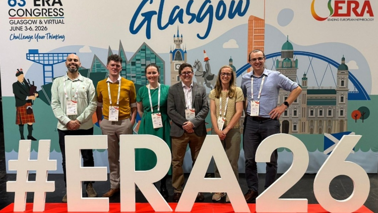 NEPHwork committee members in front of ERA 2026 branded photo wall 