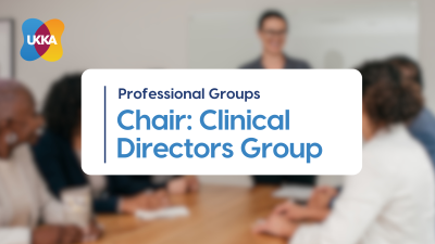 Blurred background image of a professional meeting with text box of EOI role